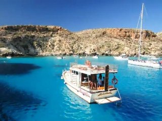 VEN.10-8-12 ISOLA DI LAMPEDUSA: GIRO IN BARCA E BAGNO ALLA TABACCARA.