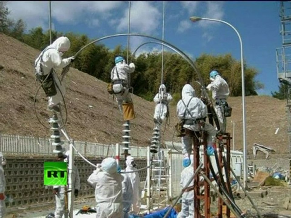Images of 'Fukushima heroes' inside plant, video of smoke at reactors