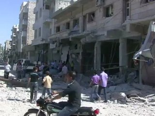 Fighting in Syria's Aleppo as raids target Al Bab