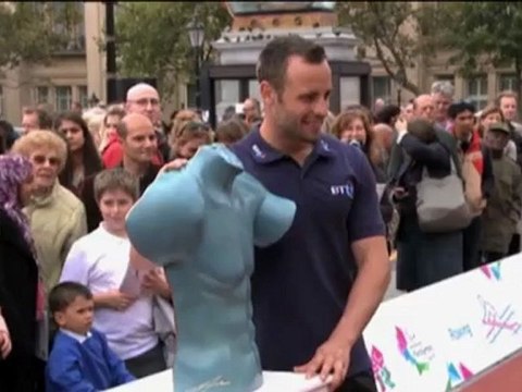 Pistorius sorry for 'blade' outburst