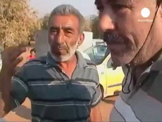 Amateur video purportedly shows lines of slain Syrian...