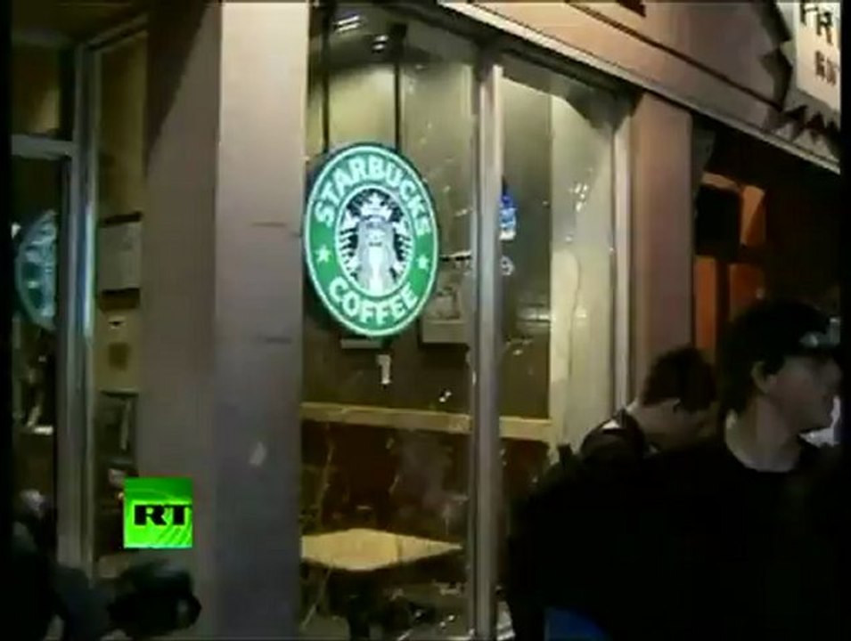 Broken windows, burnt cars left by G20 riots in Toronto