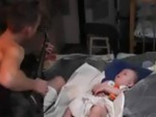 Dad Puts Baby to Sleep with Metallica Cover