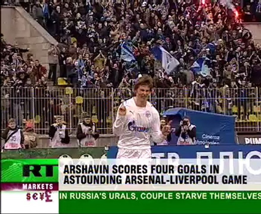 Liverpool rocked as Arshavin scores