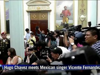 Hugo Chavez sings with famous Mexican musician