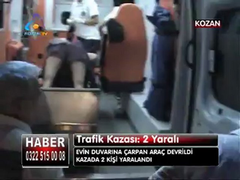 KOZAN TV_ EVİN DUVARINA ÇARPAN ARAÇ TERS DÖNDÜ 2 KİŞİ YARALANDI