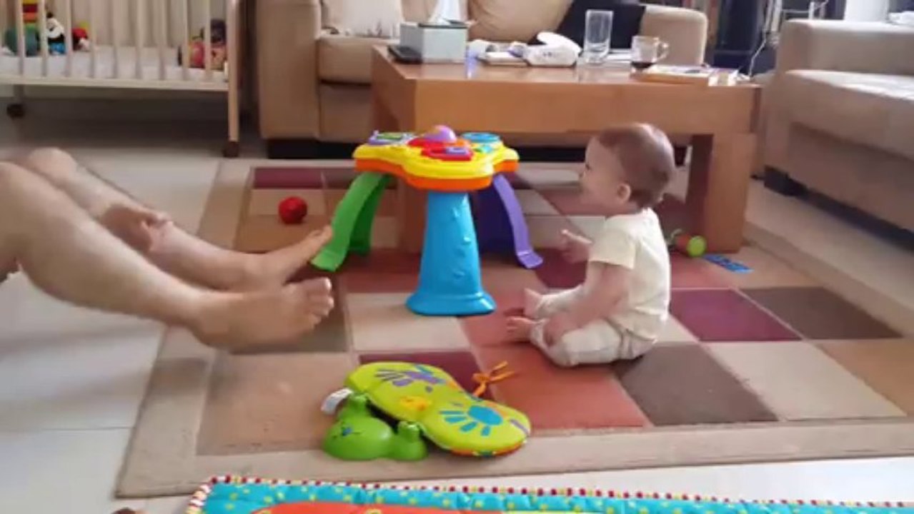 Baby Tommy Laughs as Dad Juggles