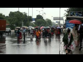 Monsoon Surprises: Crowded bus stop at Safdarjung