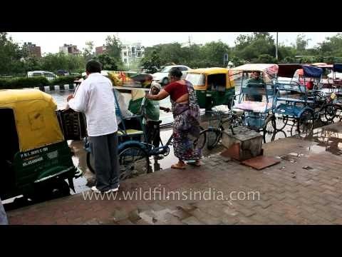 Rickshaws and autos waiting for commuters outside Akshardham Metro