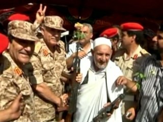 Laying down their arms in Libya