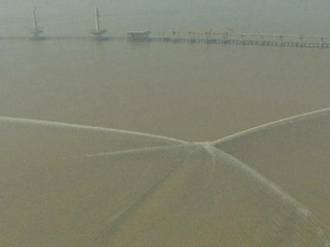 Spectacular Sight as Tidal Surge Reunites in China's Qiantang River