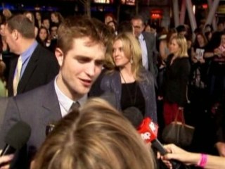 Pattinson tops sexy men list, Disney releases peek of "Lone Ranger"