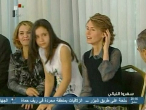 Syrian first lady Asma al-Assad meets students in Damascus.