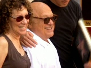 DeVito and Perlman split, Garland's 'Oz' dress to go on auction