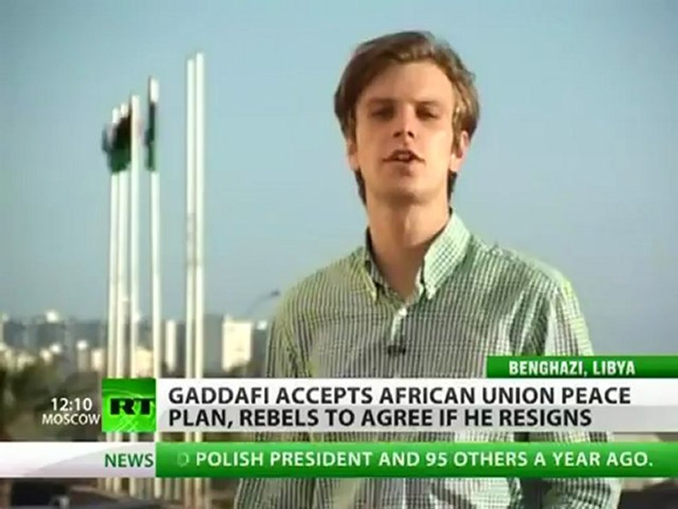 Peace cheered in Tripoli while rebels insist Gaddafi goes