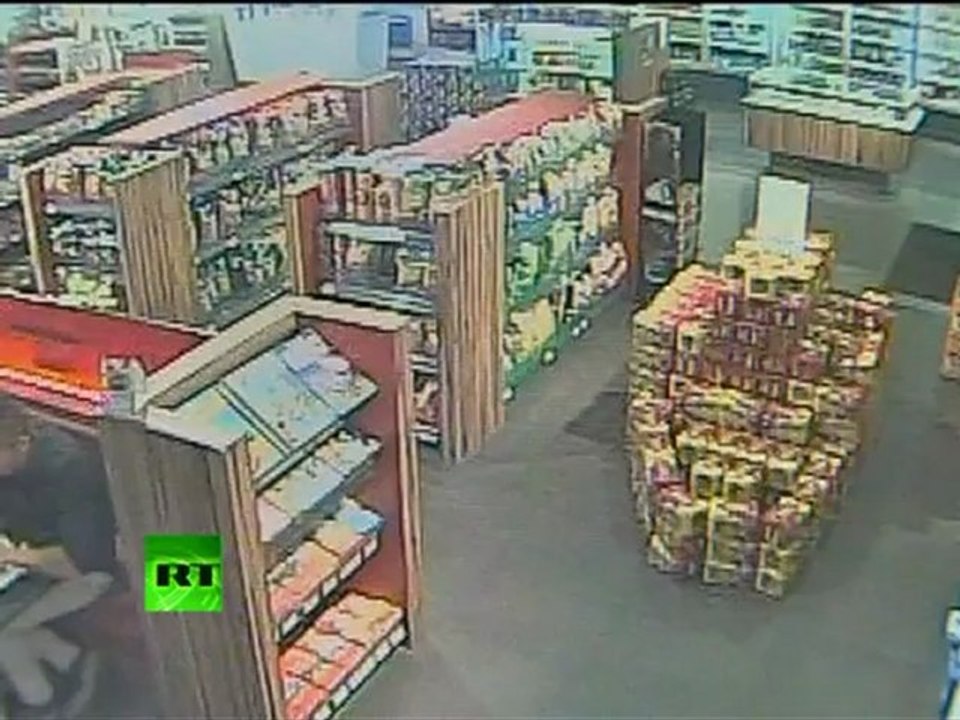 CCTV: Belgian footballer runs Porsche into store