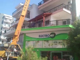 Τοποθετηση παλετας με φωτοβολταικα.Γερανοι θεσσαλονικη 6944355797