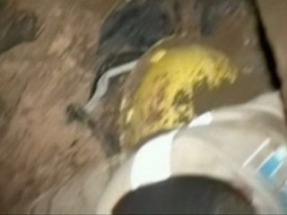 Cololmbian workers rescued after being buried in mud