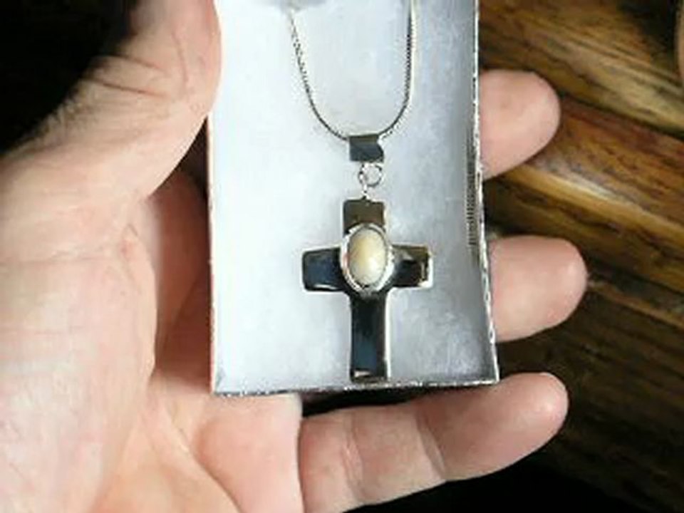 Sterling hollow cross W faceted ethiopia opal