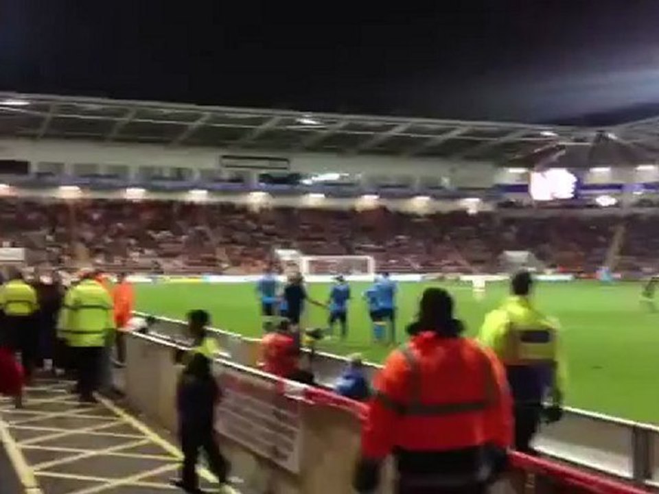 Billy Sharp celebrates by eating hot dog at Nottingham Forest v Blackpool