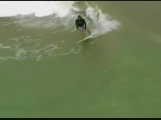 Surfers ride the big waves from Hurricane Sandy