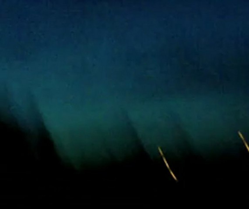 bottle rocket with tiny flare attached on a parachute