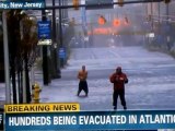 Men Dance Behind Reporter Covering Hurricane Sandy In Atlantic City