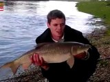 Will Ablett with his pristine 14lb 8oz barbel from the river Trent