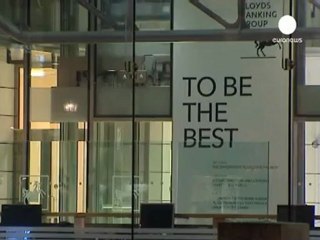 Скачать видео: Lloyds Banking Group réduit ses pertes au troisième...