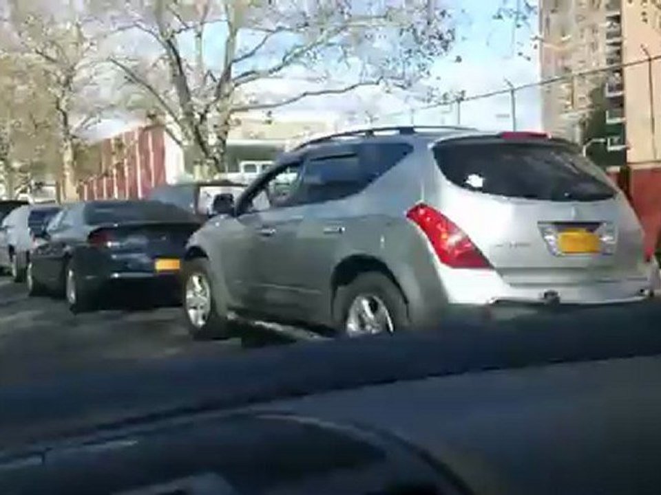 Vehicles line up to fill up gas, Forest Hills Mobil gas station