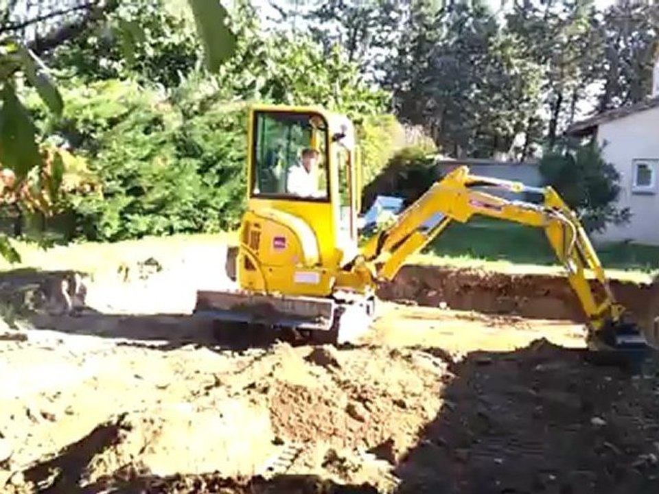 Création d'un emplacement de piscine et déblaiement
