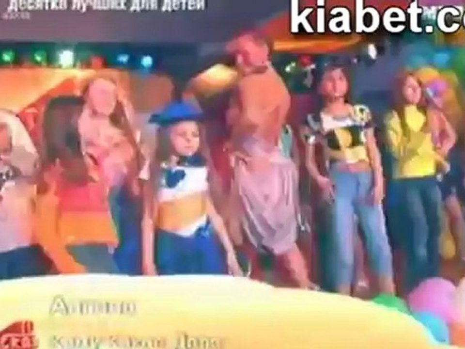 sexy adult woman with big boobs sing the song with children