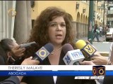 Consignan listas de presos políticos y exiliados ante Miraflores para revisión de Chávez
