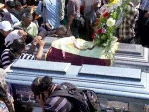 Guatemalan villagers mourn quake victims