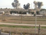 Syrian jet bombs embattled border town
