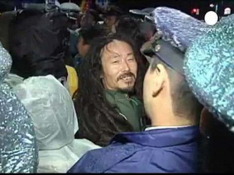 Japan restarts reactor despite protests