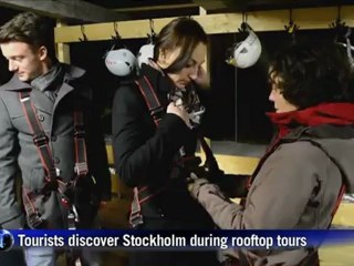 Swedish and International tourists discover the skyline of Stockholm by trying the Rooftop tour