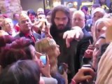 Katy Perry hides under a table to avoid Russell Brand