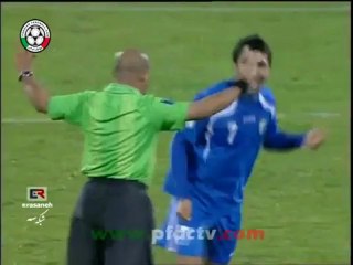 player tries to celebrate with the referee after final whistle