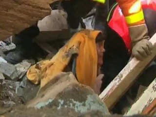 Gaza woman dragged from rubble after Israeli airstrike