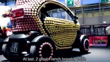 A Renault Twizy covered in mouth-watering macarons. Yum.