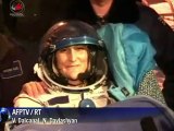 Astronautas chegam à Terra