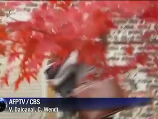 Pivô do escândalo Petraeus aparece com a família