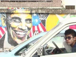 Obama pushes change on historic Myanmar visit