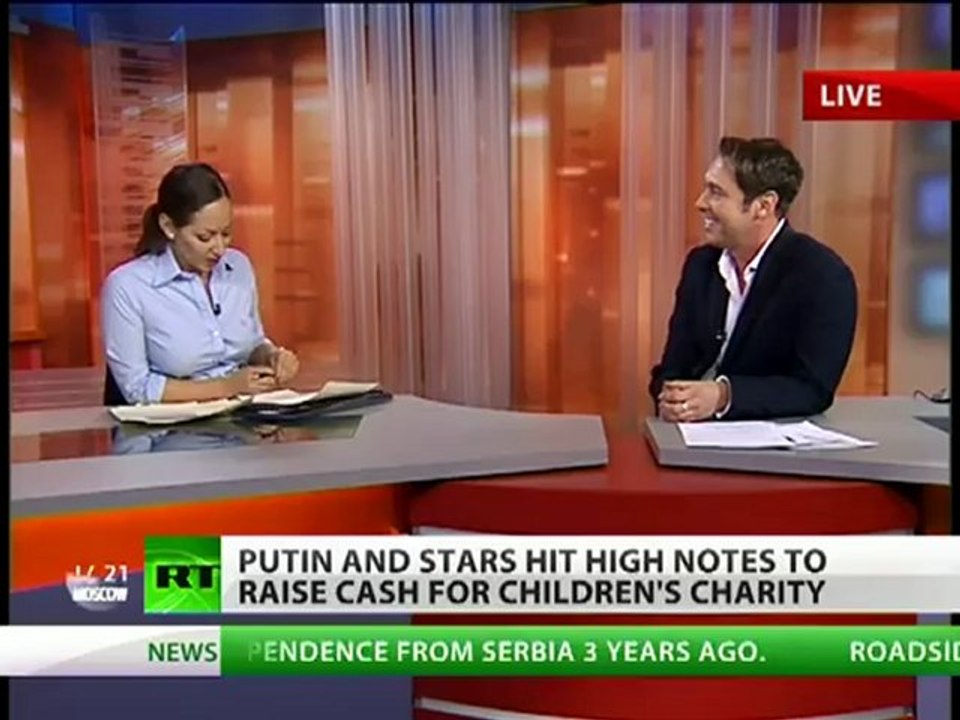 Putin & stars hit high notes to raise cash for children's charity