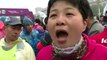 Beijing marathon runners brave pollution