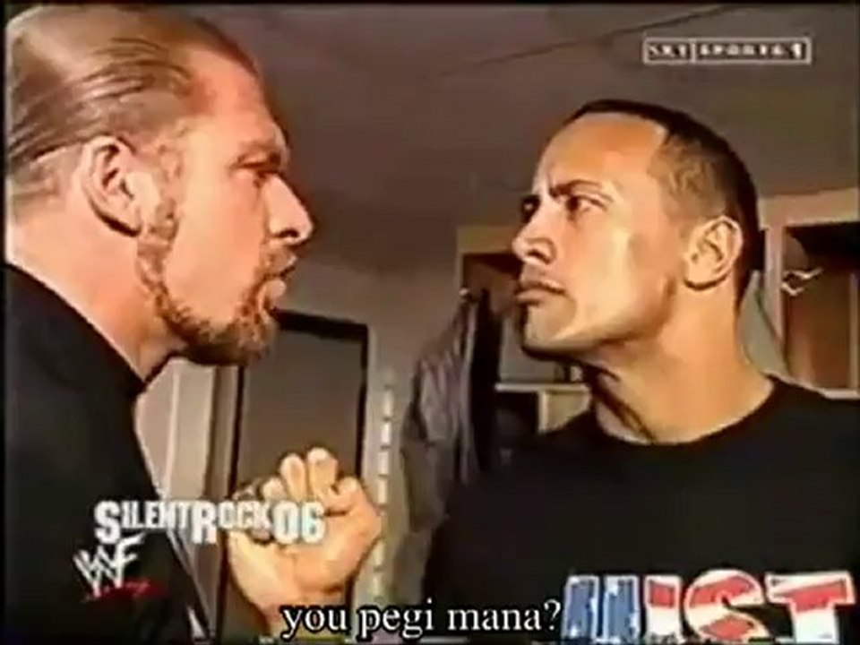 The Rock vs Triple H