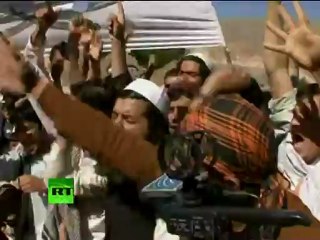 Angry mob torches Obama effigy in Koran burning protest