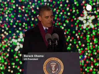 Obama lights National Christmas tree
