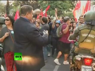 Riot dogs & water cannons: Video of clashes, protests in Chile